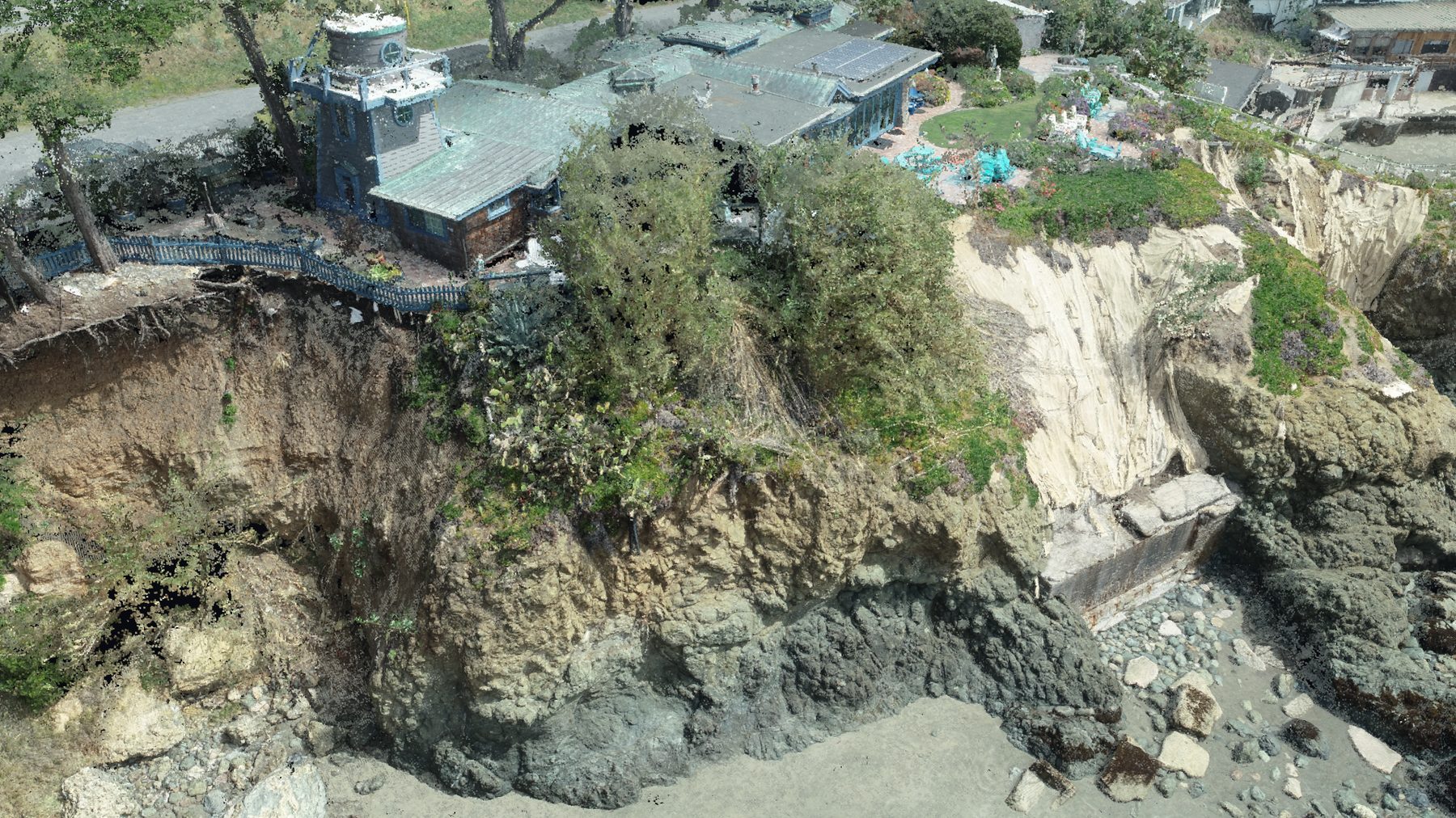 Colorized LiDAR point cloud of a coastal site, rendered as a flythrough still